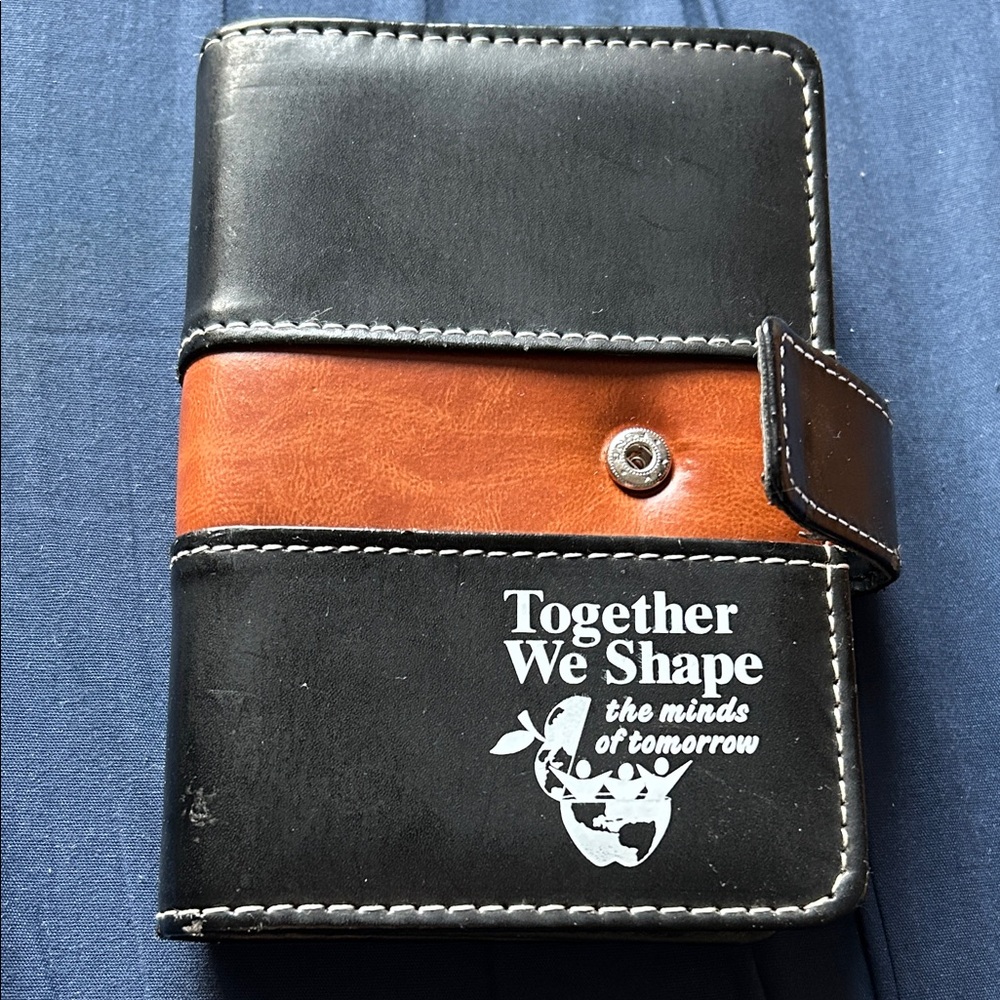 Black and Brown planner with the pen